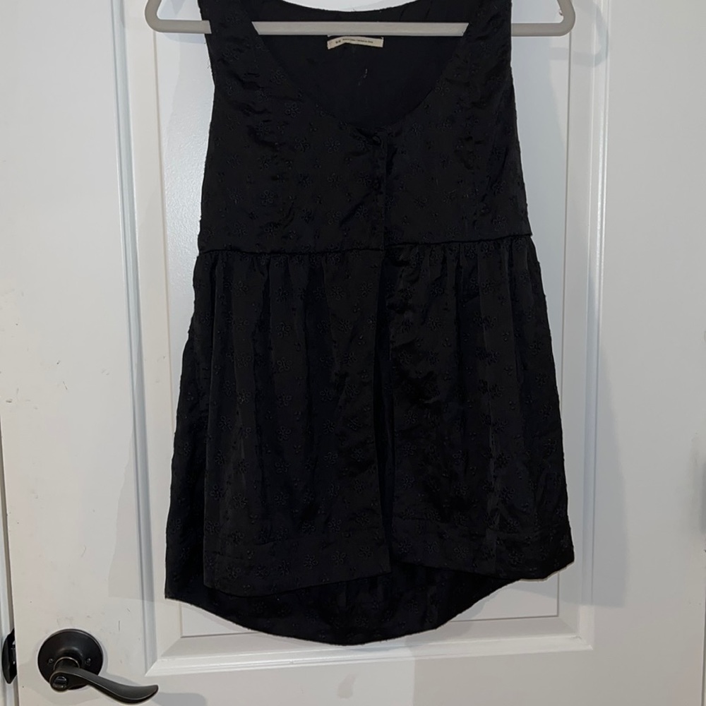 Black blouse.